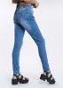 Jeans cintura media destrucción sold by Shasa
