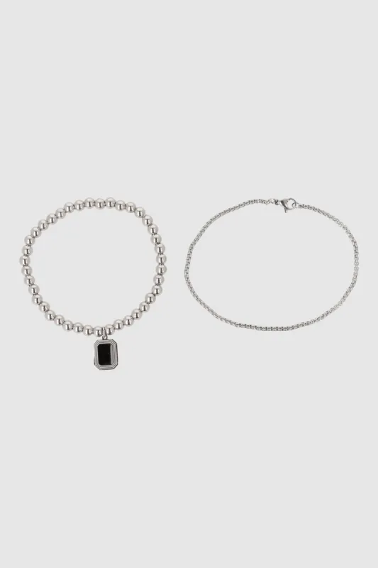 Doble pulsera acero con dije rectangulo sold by Shasa