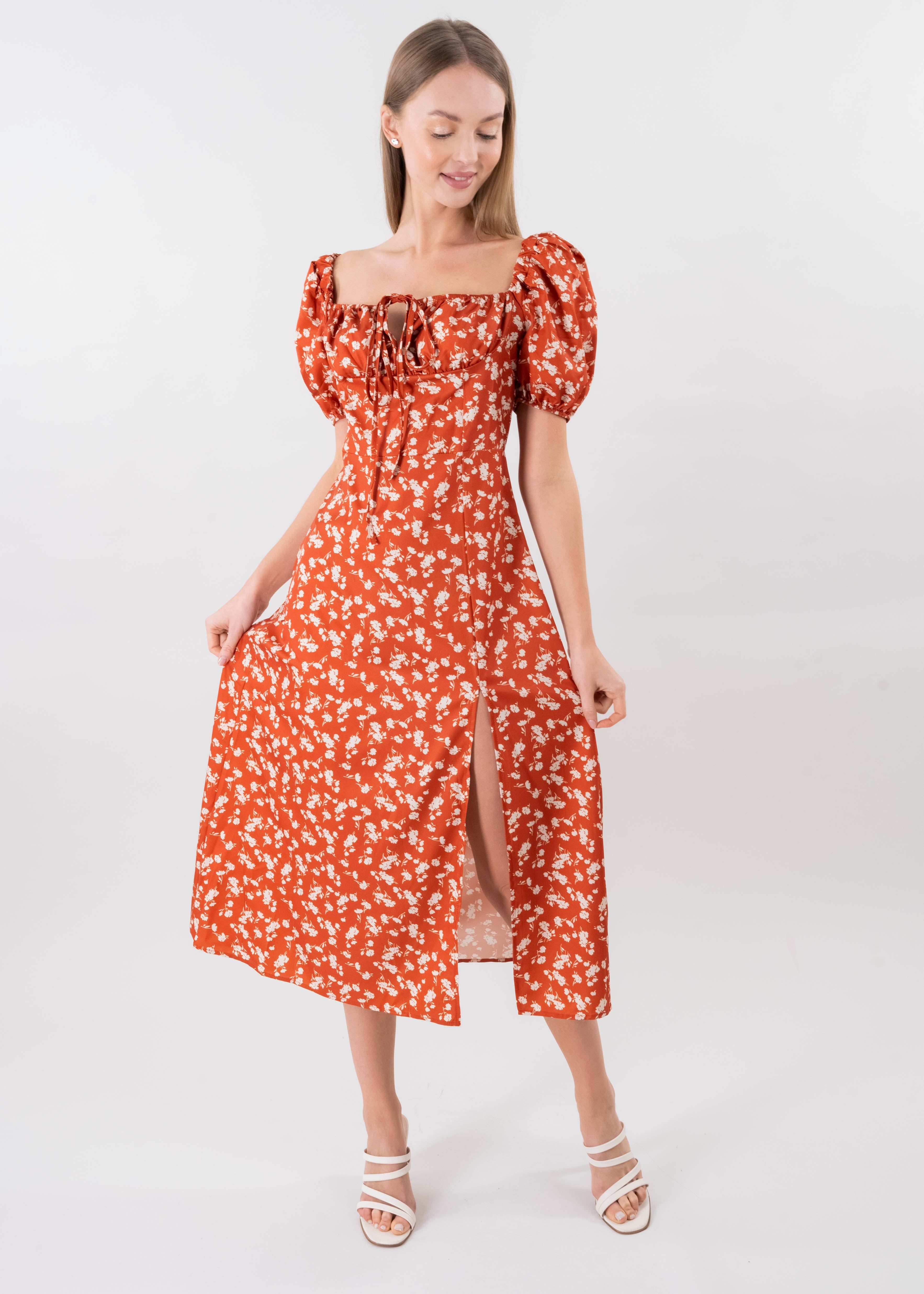 Vestido midi manga abullonada flores sold by Shasa