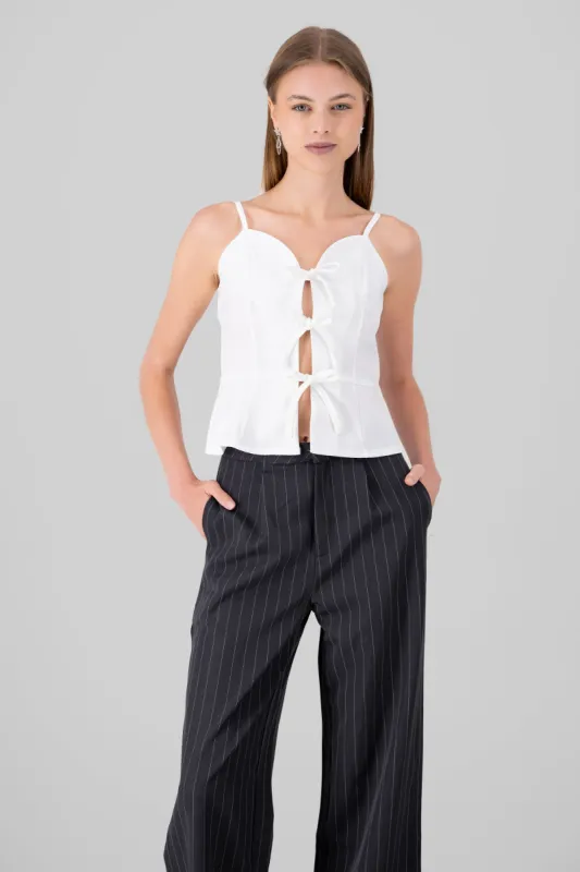 Top sin mangas abertura liso sold by Shasa