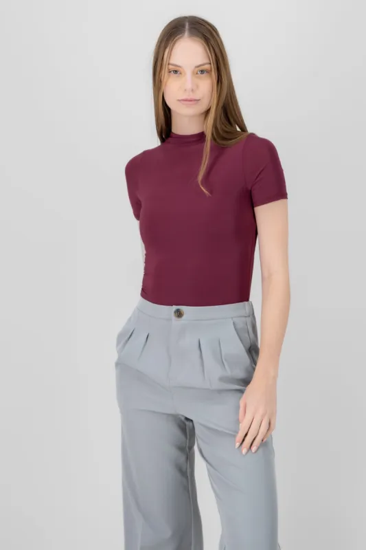 Body doble tela escote alto manga corta sold by Shasa