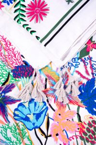 Pañuelo flores tassels sold by Shasa