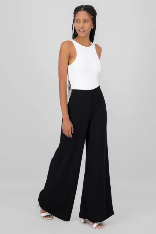Pantalon liso cierre sold by Shasa
