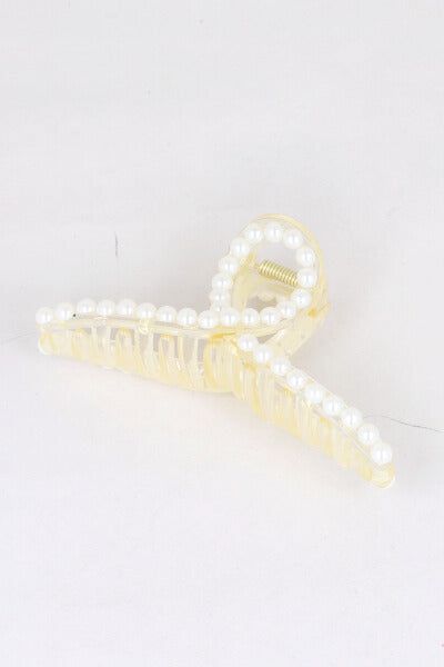 Pinza larga perlas sold by Shasa