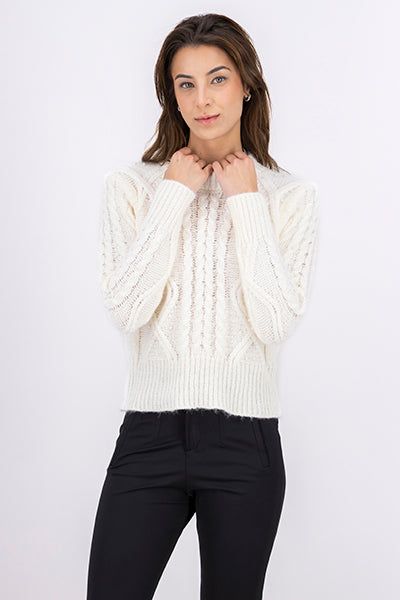 Suéter tejido aplicaciones perlas sold by Shasa