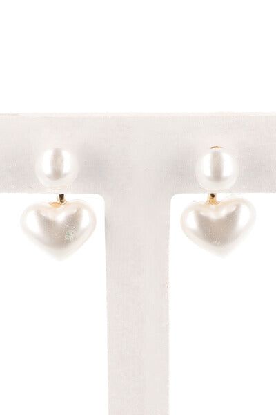 Aretes corazón aperlado sold by Shasa