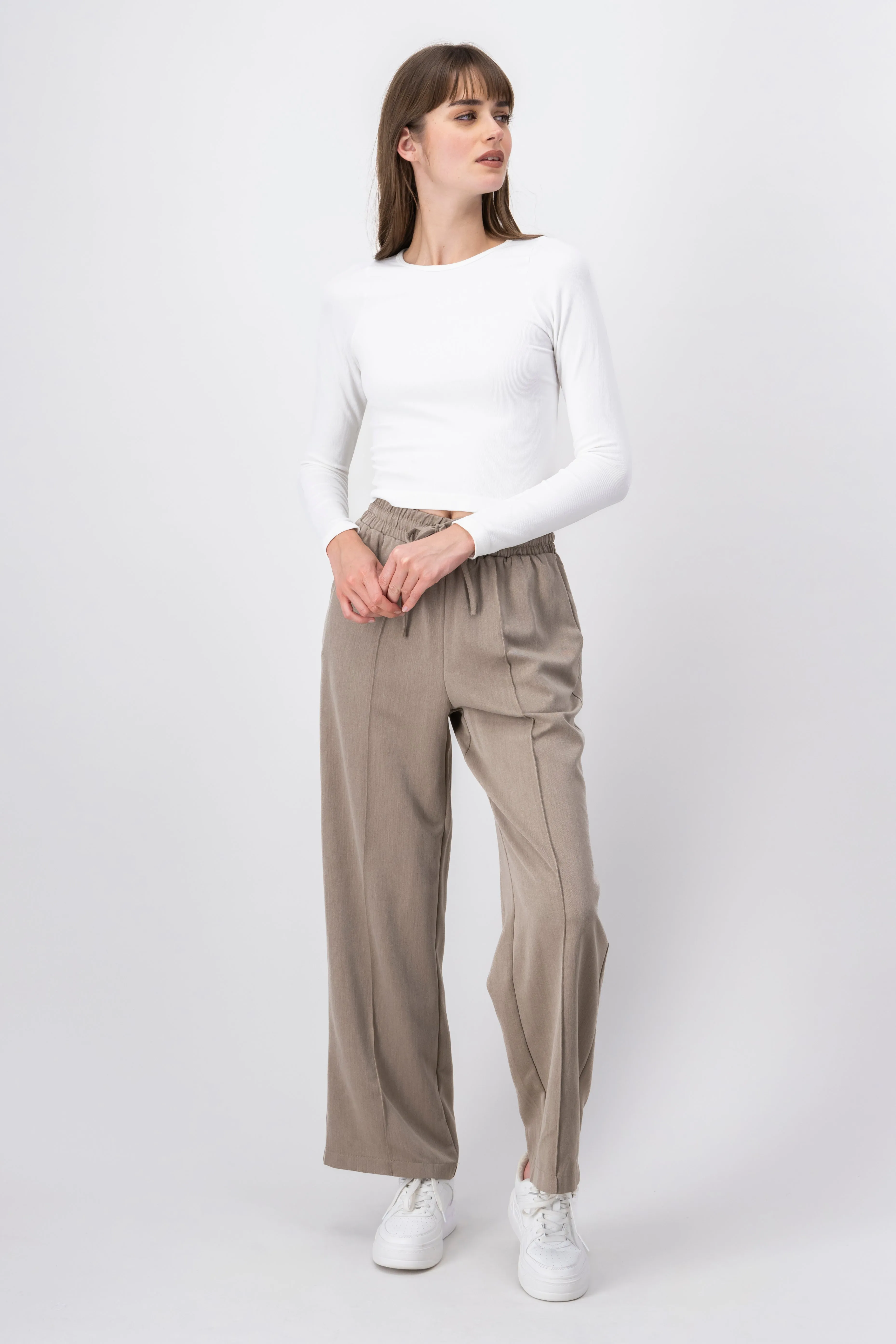 Pantalon resorte detalle costura sold by Shasa