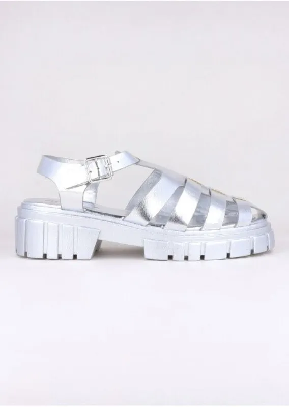 Sandalias cangreja metálica sold by Shasa