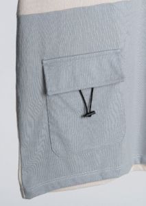 Playera bicolor bolsas cargo sold by Shasa