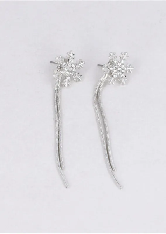 Aretes copos nieve brillos sold by Shasa
