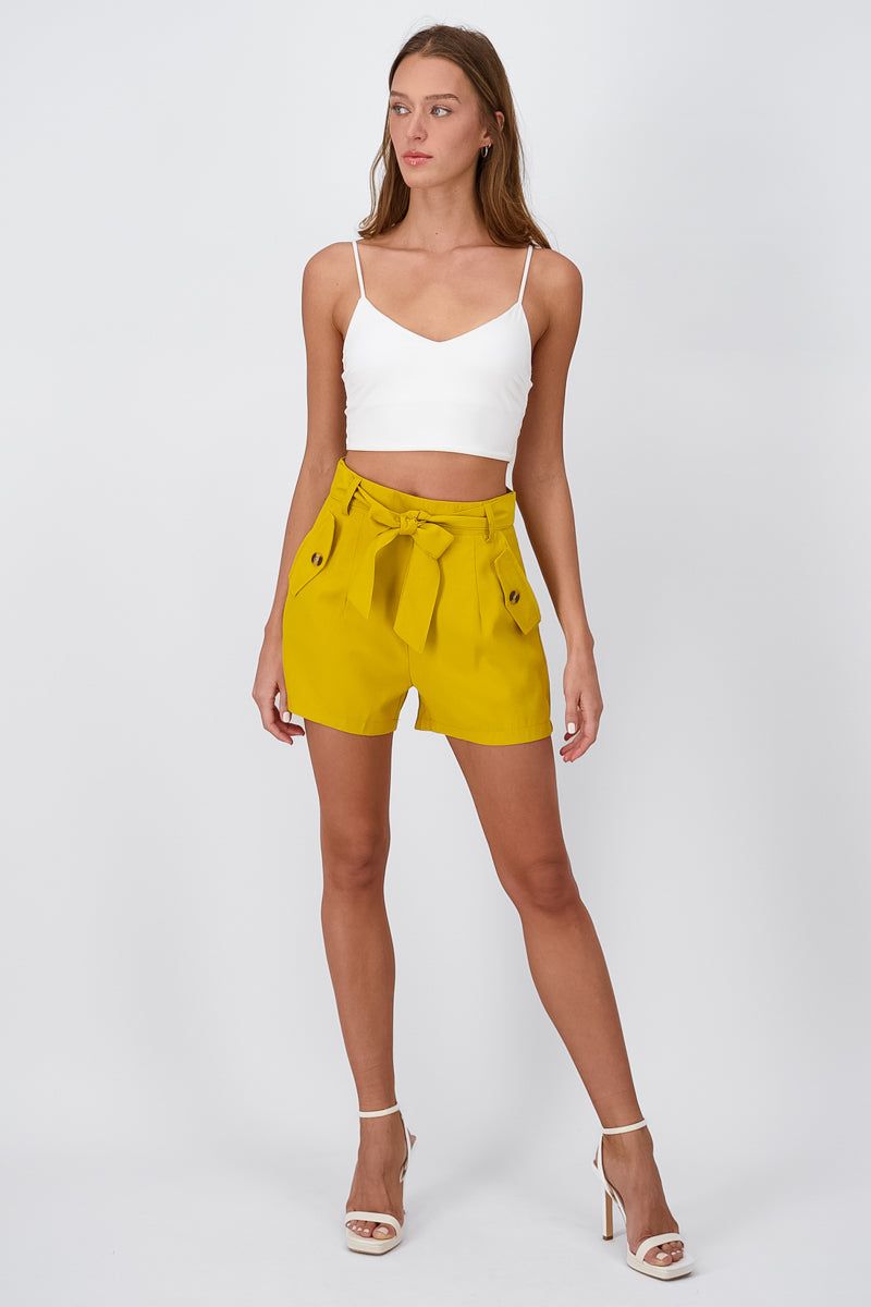 Short detalle moño bolsas sold by Shasa