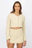 Saco botones brillos sold by Shasa