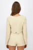 Saco botones brillos sold by Shasa