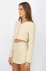 Saco botones brillos sold by Shasa