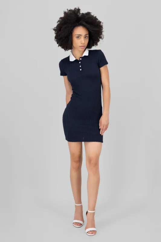 Vestido mini textura con cuello polo sold by Shasa