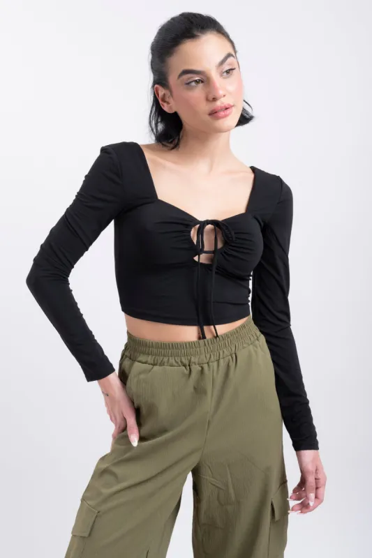 Top manga larga cintas escote sold by Shasa