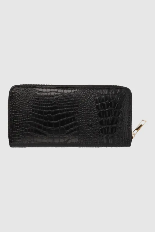 Cartera grande efecto reptil sold by Shasa