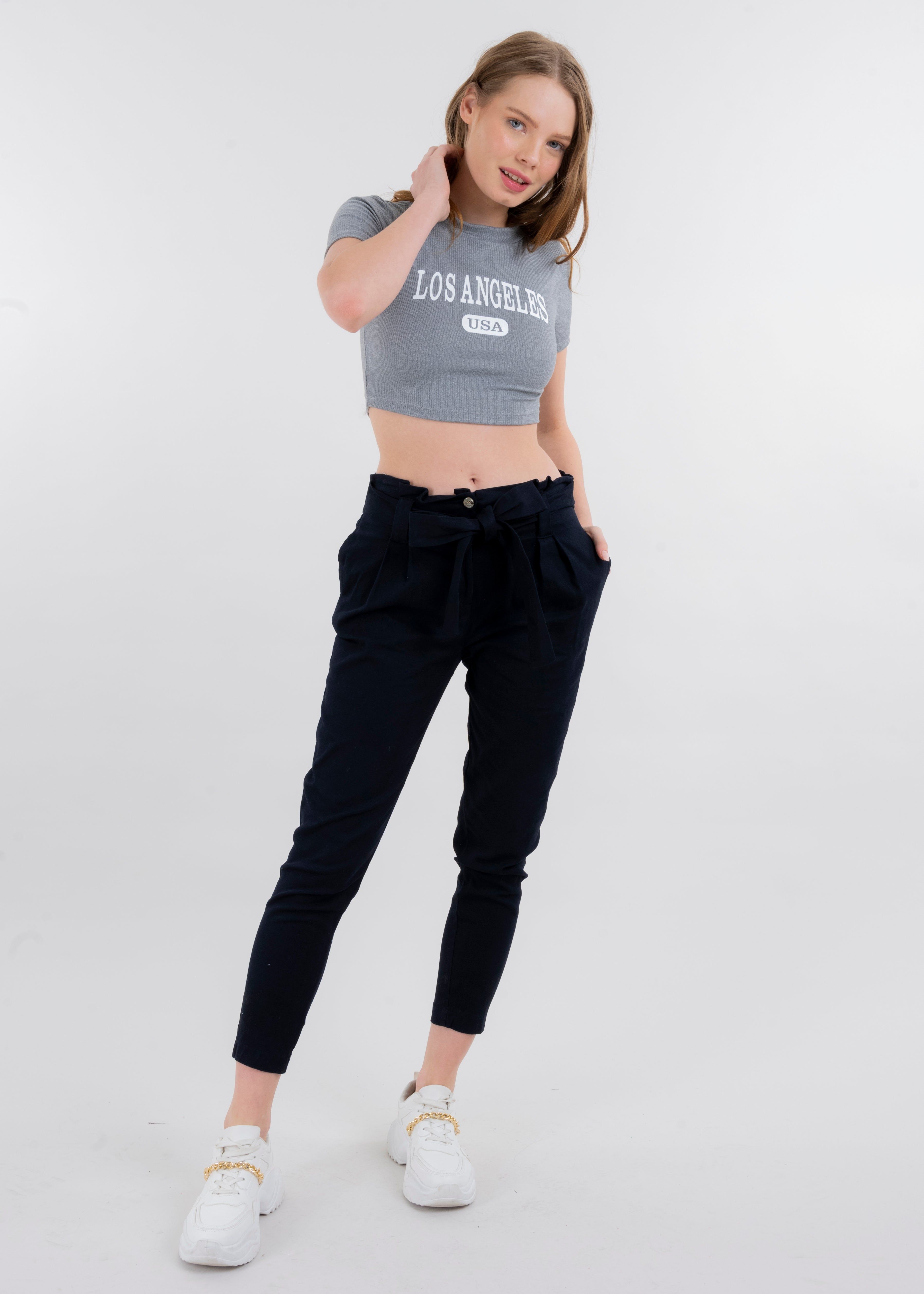 Pantalón paper bag cintura alta cinturón sold by Shasa