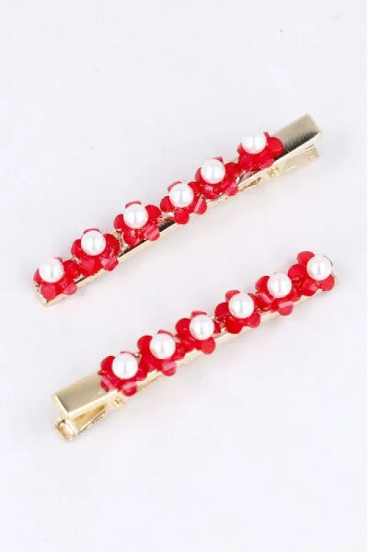 Set 2 piezas pasador flores sold by Shasa