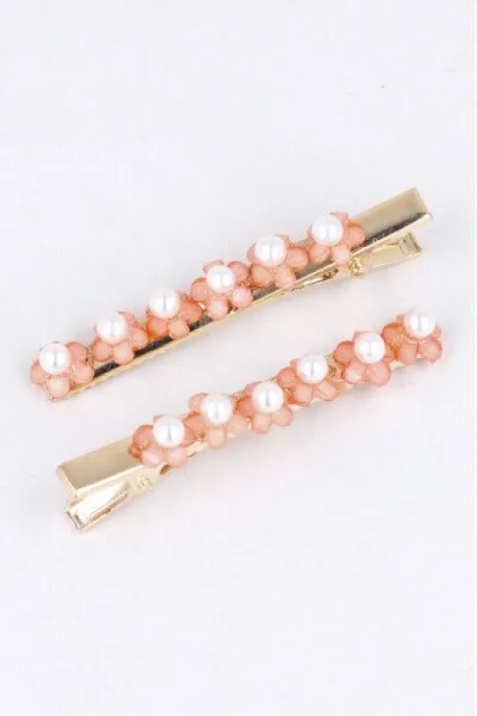 Set 2 piezas pasador flores sold by Shasa