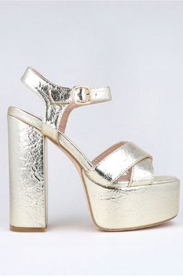 Tacón plataforma metálico sold by Shasa