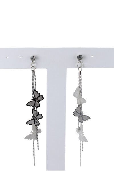 Aretes colgantes mariposa sold by Shasa