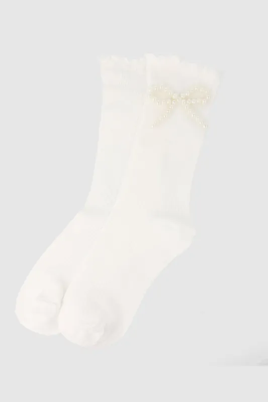 Calcetin moño perlas sold by Shasa