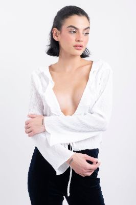 Blusa textura manga larga sold by Shasa