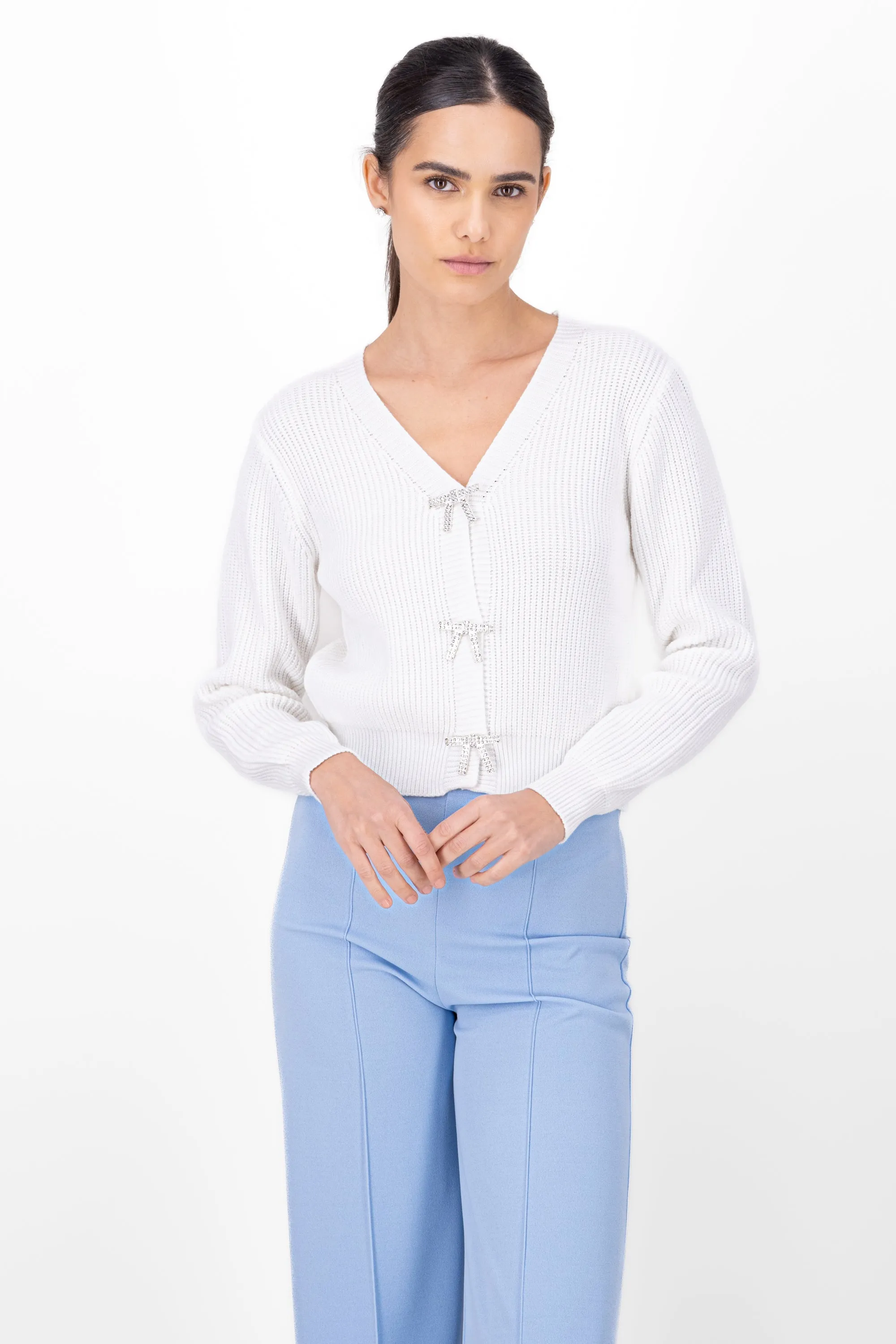 Cardigan con boton mono sold by Shasa