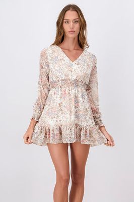 Vestido manga larga olanes flores sold by Shasa