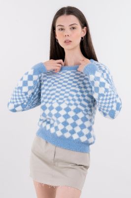 Suéter peluche ajedrez sold by Shasa