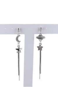 Aretes maxi planeta estrellas sold by Shasa