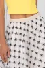 Falda midi de mesh con moños en flock sold by Shasa