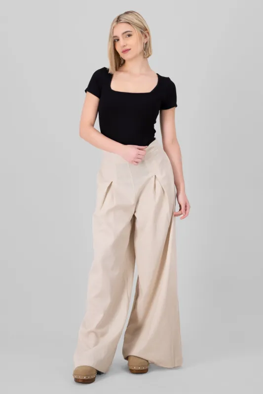 Pantalones de lino con pinzas sold by Shasa