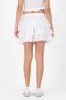 Falda short con olanes liso sold by Shasa