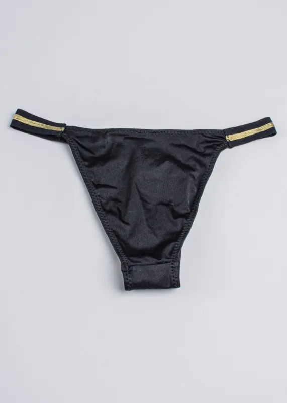 Bikini resorte brillos sold by Shasa