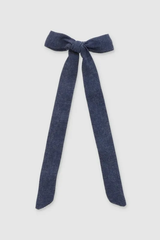 Broche metálico moño denim sold by Shasa