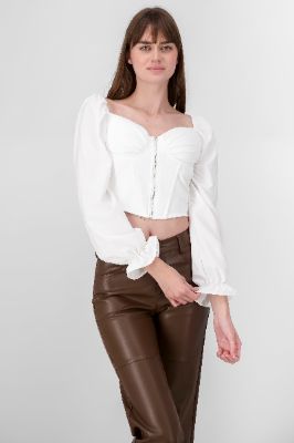 Top manga larga abullonada detalle copas sold by Shasa