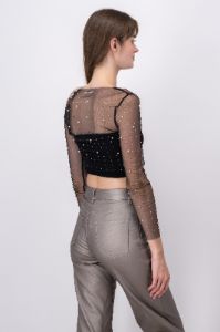 Top mesh brilloso perlas sold by Shasa