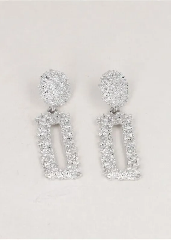 Aretes rectángulo brillo sold by Shasa