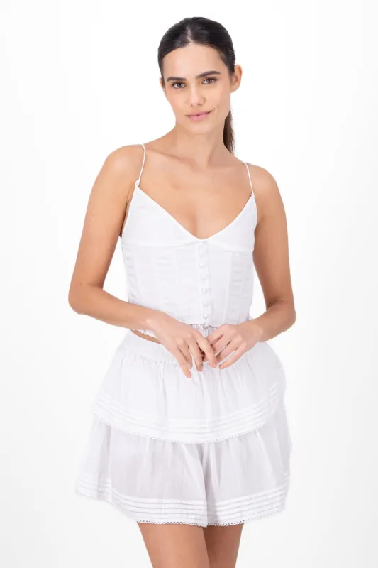 Corset con botones forrados liso sold by Shasa