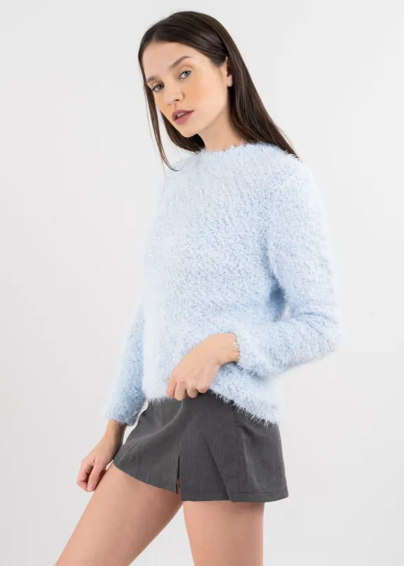 Suéter tejido peluche sold by Shasa