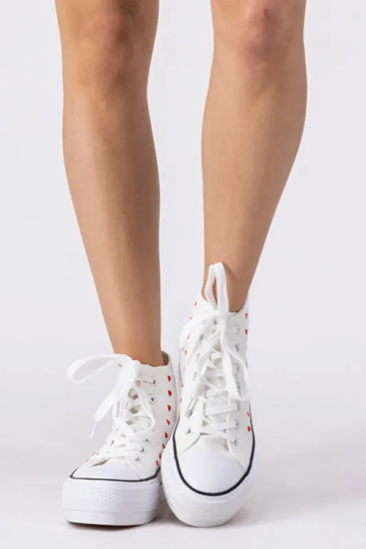 Tenis canva altos corazones sold by Shasa