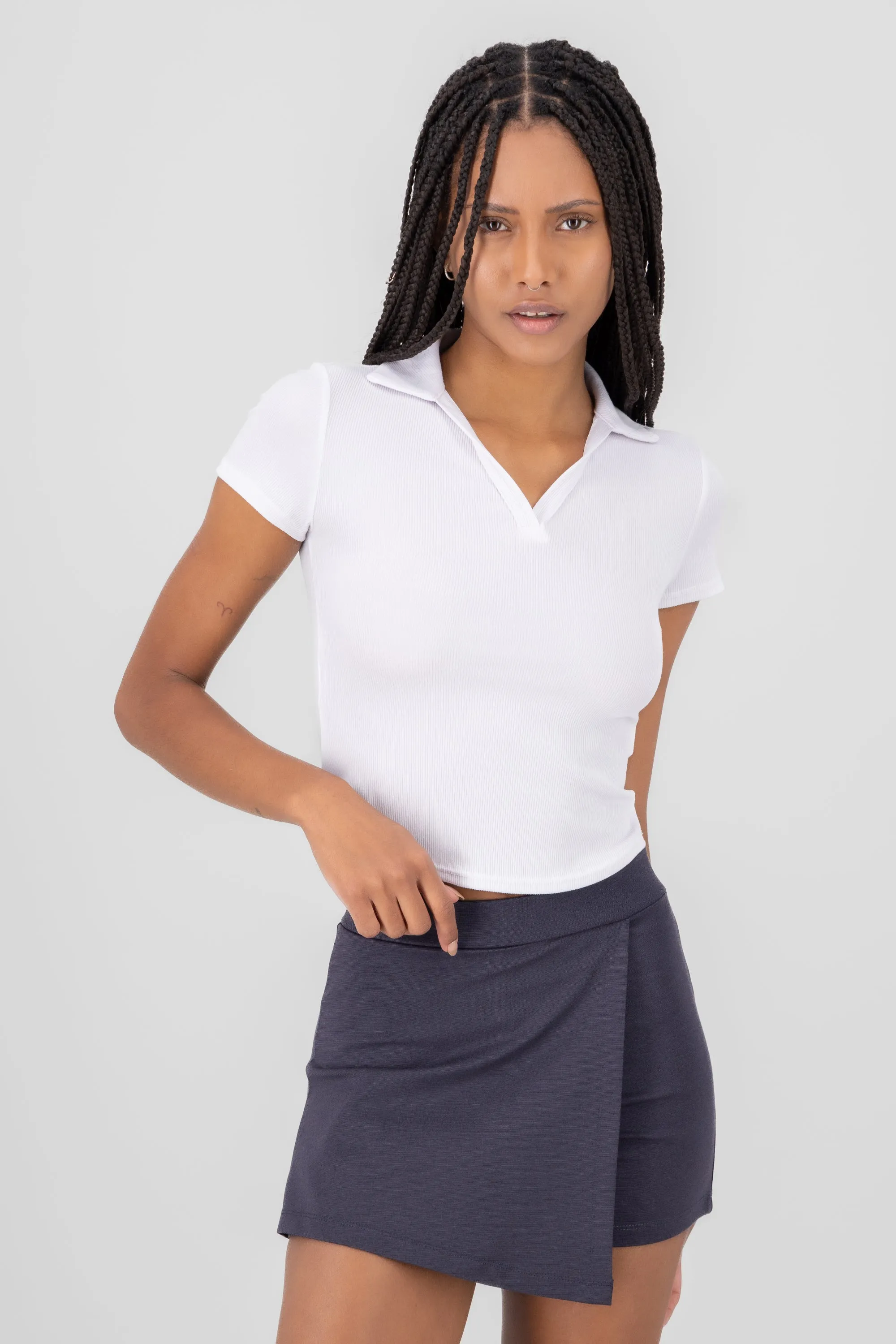 Top manga corta cuello polo sold by Shasa