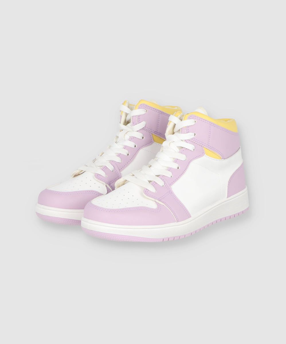 Tenis retro botín bicolor sold by Shasa