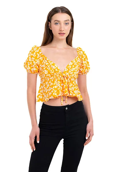 Top floreado manga abullonada sold by Shasa