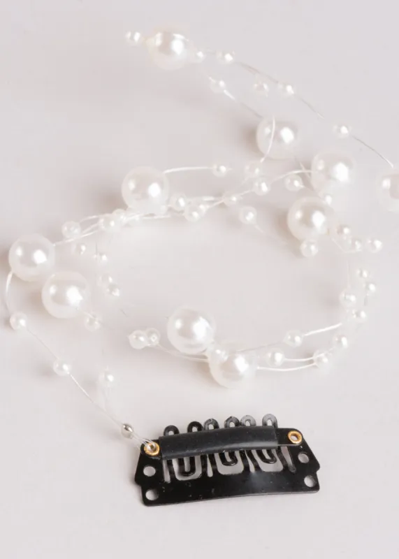 Broche tiras multiperlas sold by Shasa