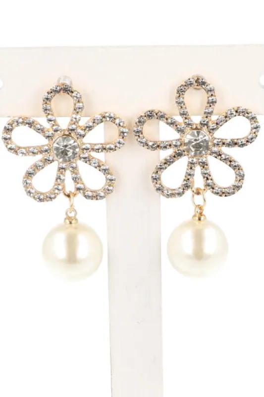 Aretes Flor Brillos Perla sold by Shasa