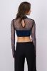 Top red cuello alto brillos sold by Shasa