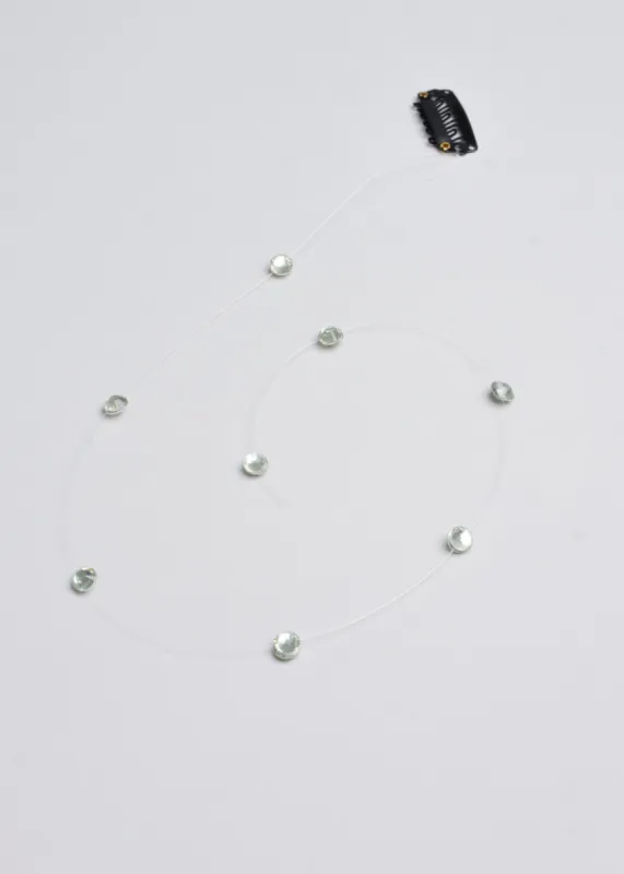 Extensión cabello brillos sold by Shasa